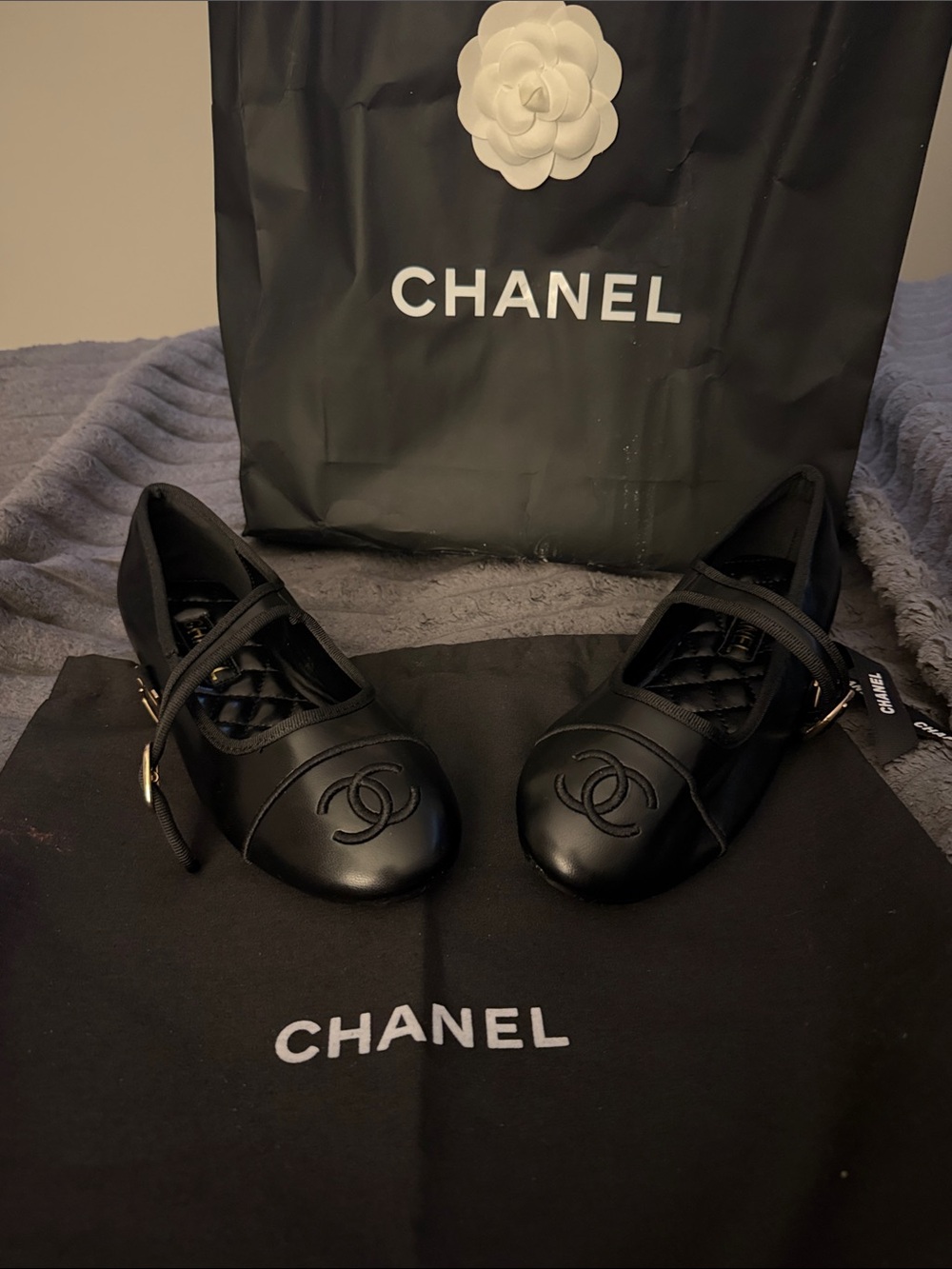 CHANEL Black Leather Quilted Mary Jane Flats with CC Embossed Toe